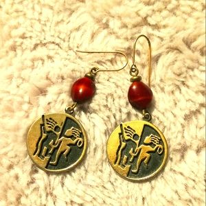 Golden South American Motif  earrings with red stones